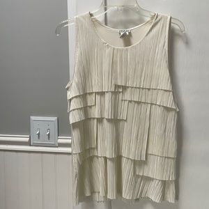 Flouncy cream sleeveless blouse